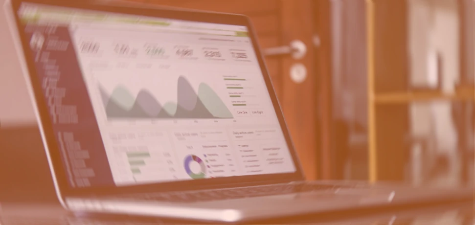 A laptop showing graphs and detail of digital marketing like SEO, PPC and social media